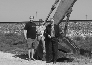 Sara on the Pendleton Farm where she did much of her research for Bleeding Kansas. Her brother Jonathan is on her right; her husband Courtenay is on her left.