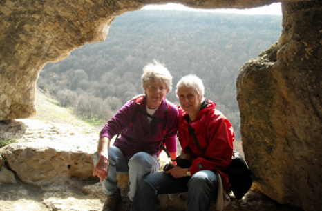 Sara sits with Cousin Barb in an ancient cave in Crimea
